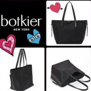 Brand New with tag and original handle wraps.